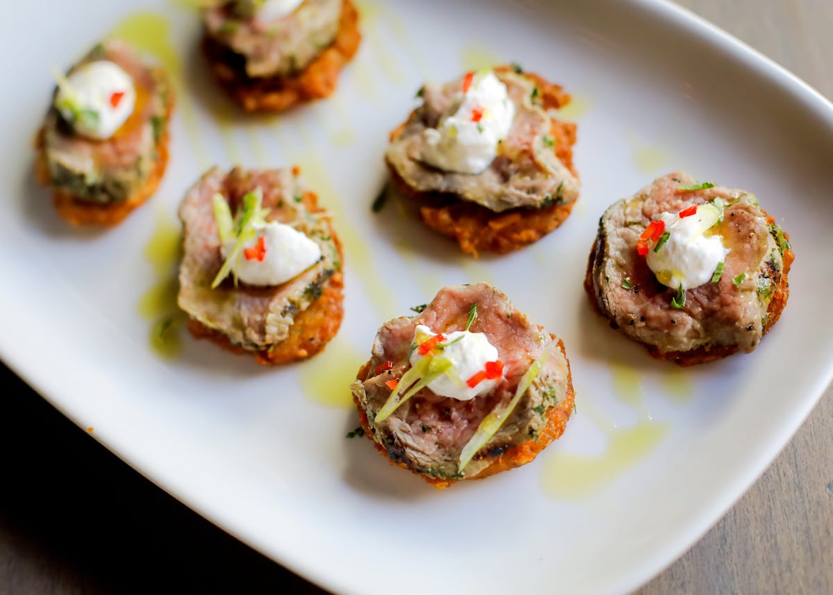 a plate with bite size appetizers